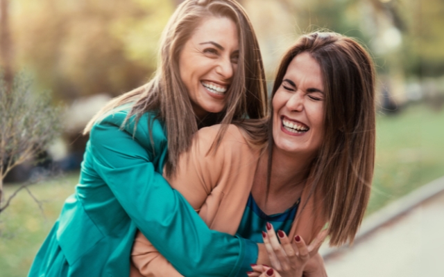 two friends laughing