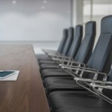 chairs at a boardroom table